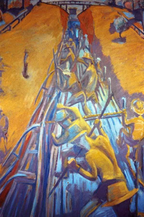 Preparing the ground for the laying of sleepers and track is back breaking work particularly in the unforgiving summer heat. By Christopher James Hamilton Blake